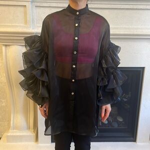 Sheer black dress shirt with ruffled sleeves. One size.worm once .